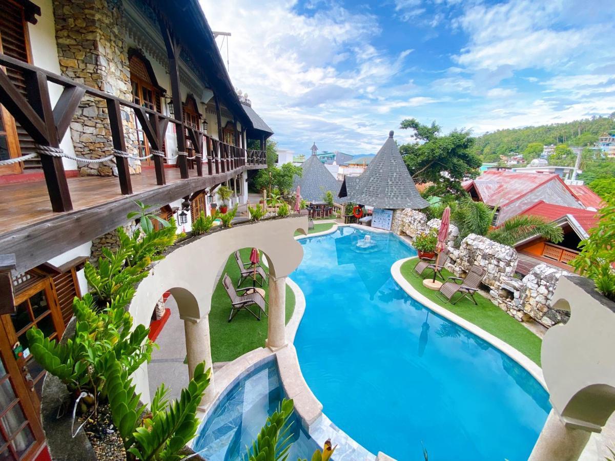 Tropicana Castle Dive Resort Powered By Cocotel Puerto Galera Bagian luar foto